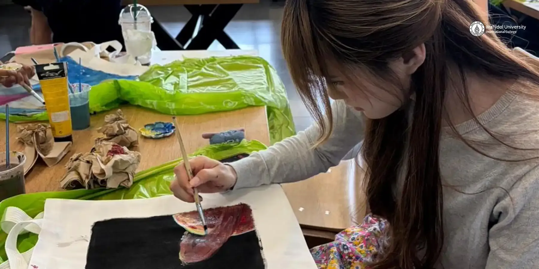 From Canvass to Carryall: Students Apply Artwork on Tote Bags